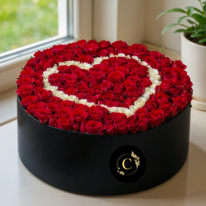 200 Rosas en Caja Redonda Negra con Diseño de Corazón Blanco